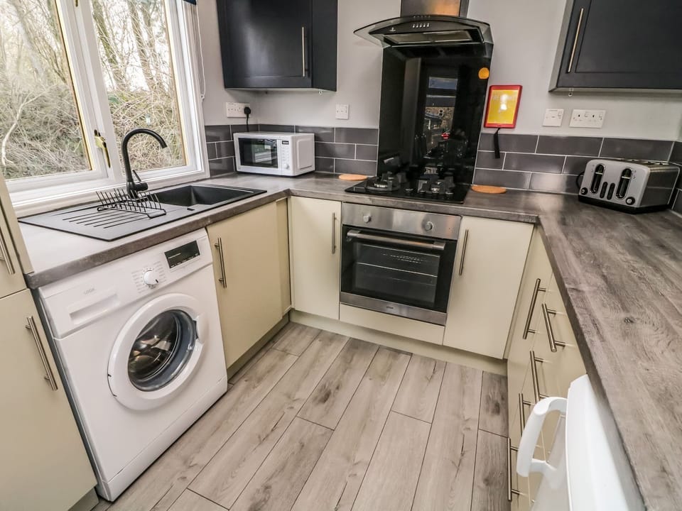 Fridge, electric kettle, toaster, cookware/dishes/utensils