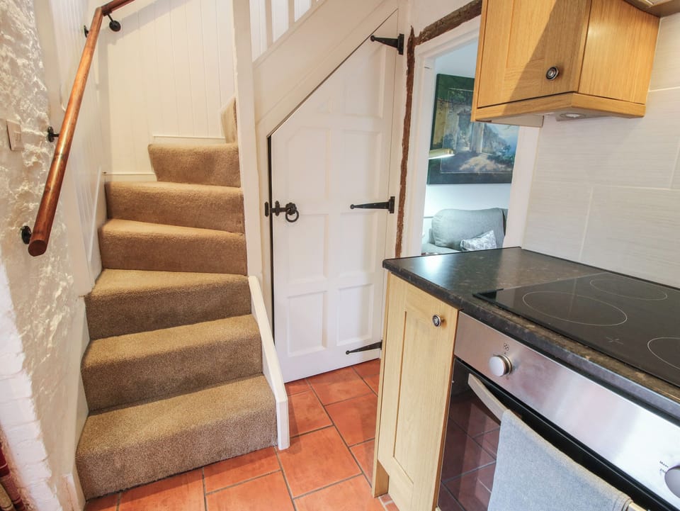 Fridge, electric kettle, cookware/dishes/utensils