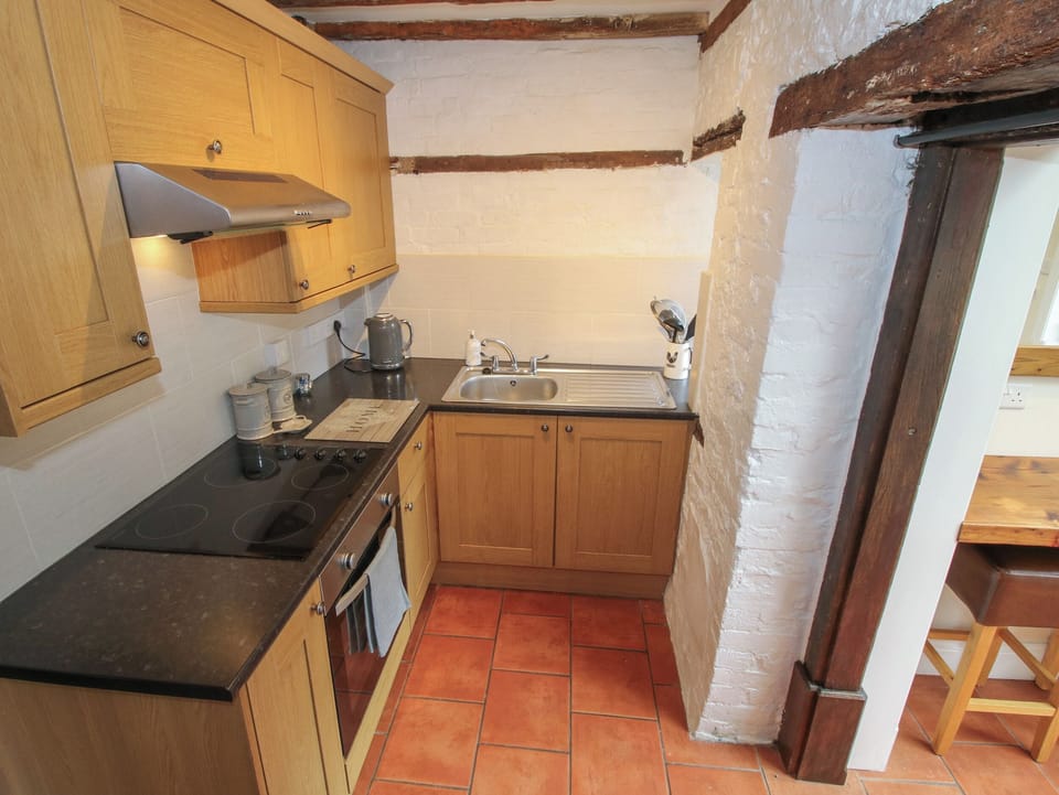 Fridge, electric kettle, cookware/dishes/utensils