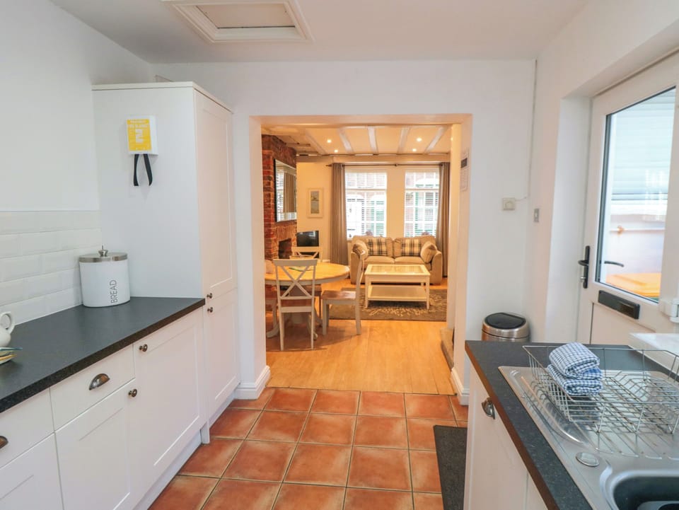 Fridge, electric kettle, toaster, cookware/dishes/utensils