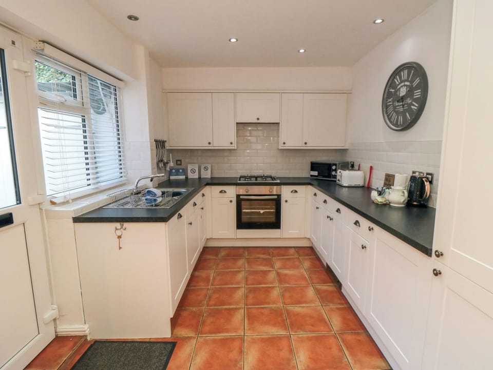 Fridge, electric kettle, toaster, cookware/dishes/utensils