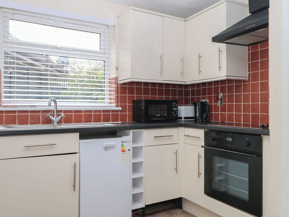 Fridge, electric kettle, toaster, cookware/dishes/utensils