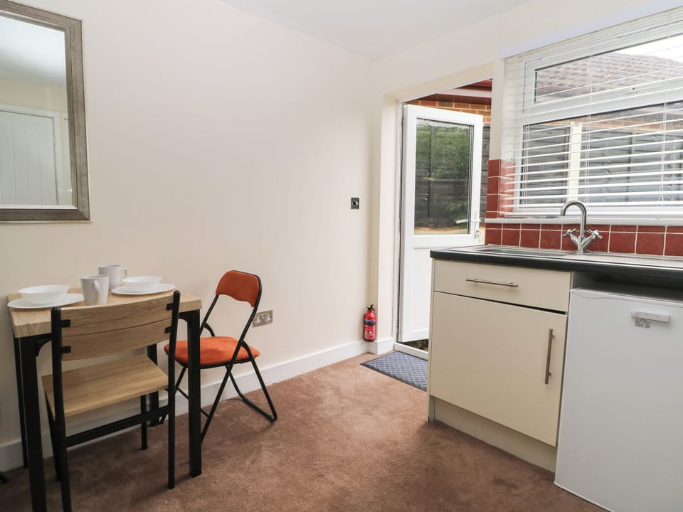 Fridge, electric kettle, toaster, cookware/dishes/utensils