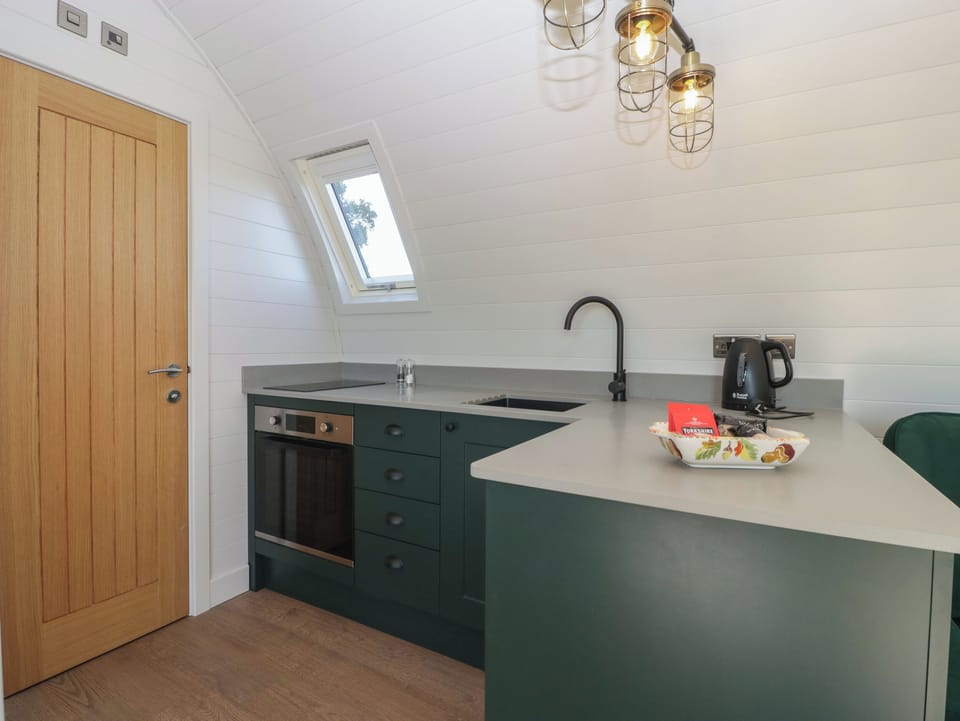 Fridge, electric kettle, cookware/dishes/utensils