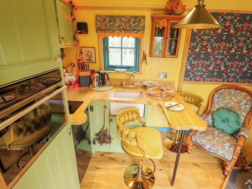Fridge, electric kettle, toaster, cookware/dishes/utensils