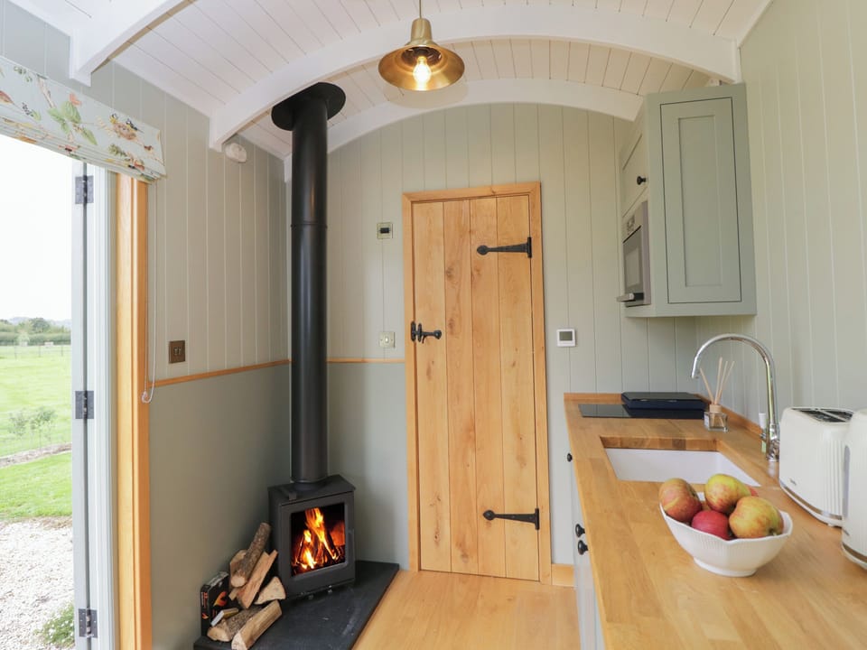 Fridge, electric kettle, toaster, cookware/dishes/utensils