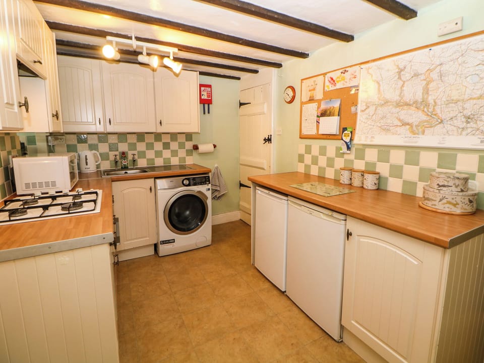 Fridge, electric kettle, toaster, cookware/dishes/utensils