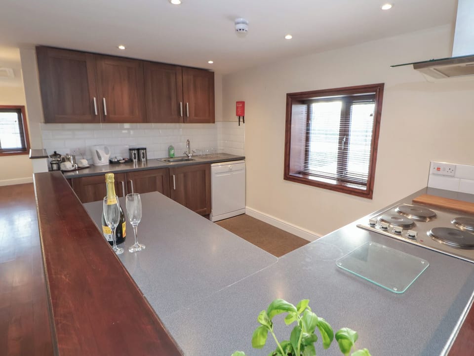 Fridge, dishwasher, electric kettle, cookware/dishes/utensils