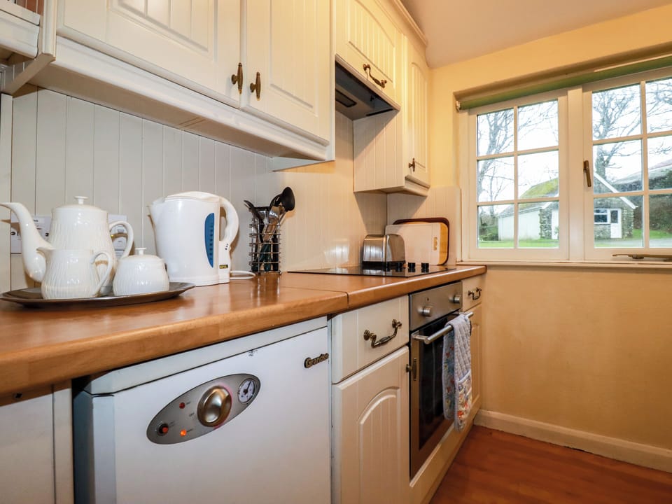 Fridge, electric kettle, toaster, cookware/dishes/utensils