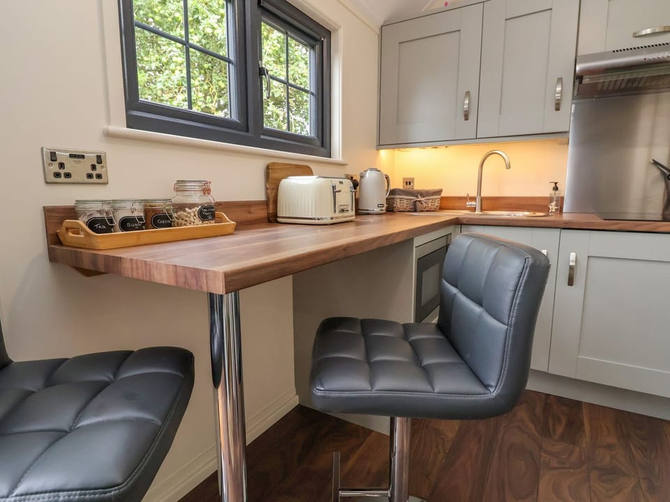 Fridge, electric kettle, toaster, cookware/dishes/utensils
