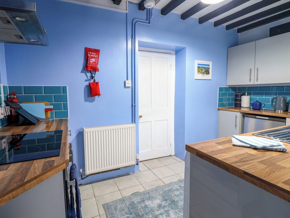 Fridge, electric kettle, toaster, cookware/dishes/utensils