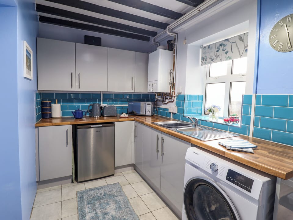 Fridge, electric kettle, toaster, cookware/dishes/utensils