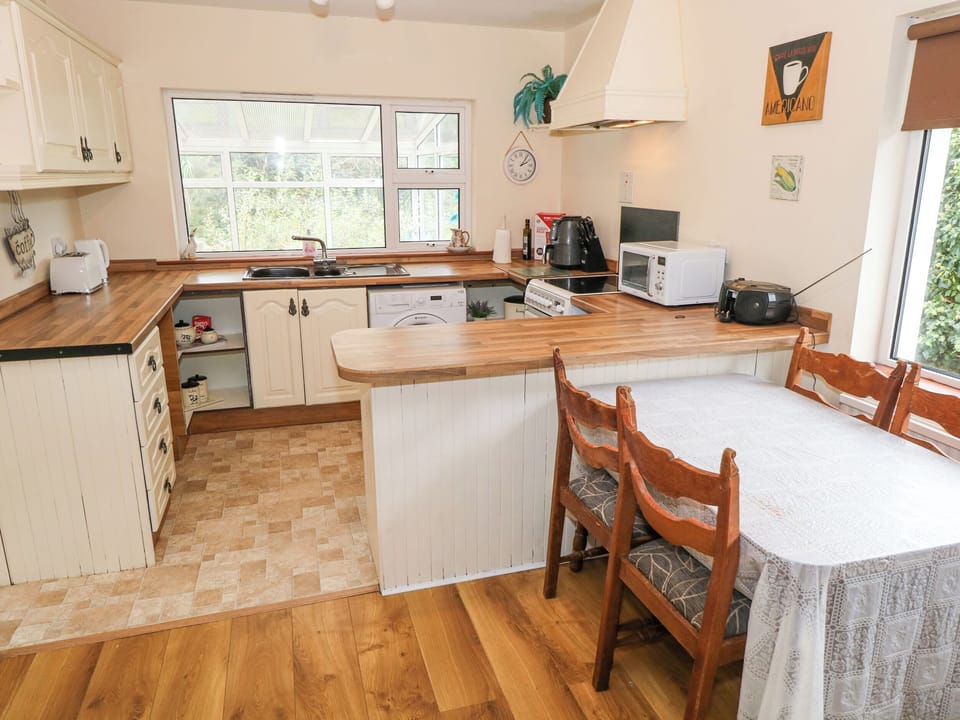 Fridge, electric kettle, toaster, cookware/dishes/utensils