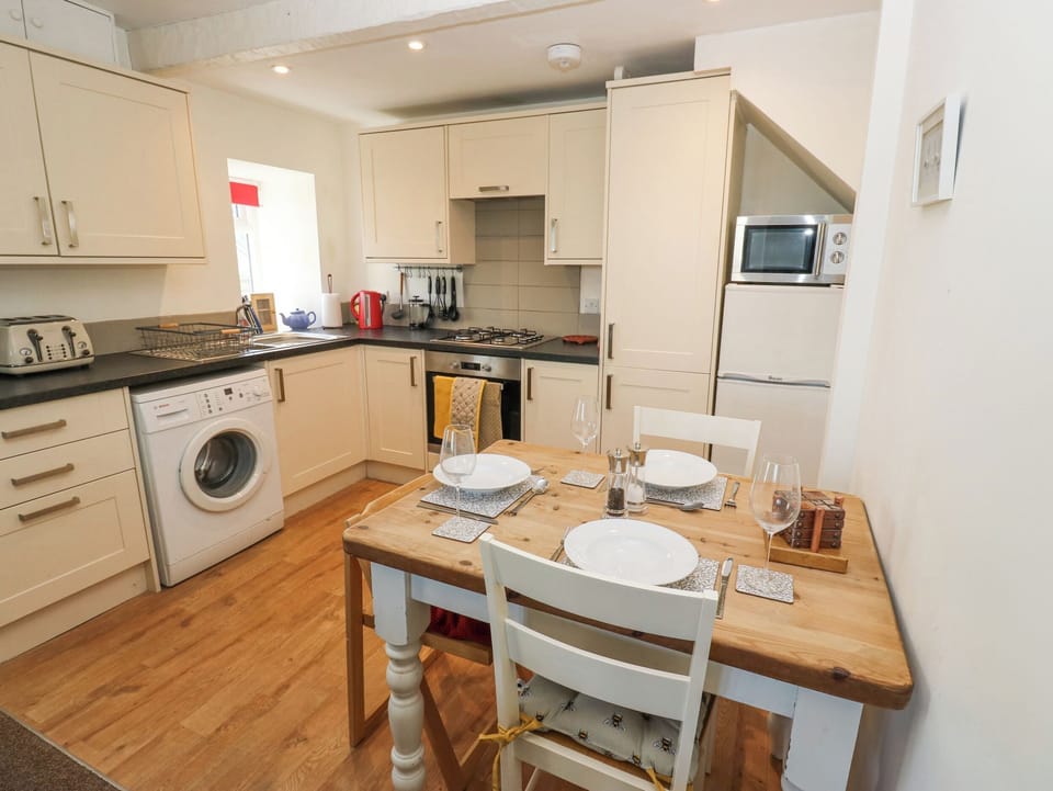 Fridge, electric kettle, toaster, cookware/dishes/utensils