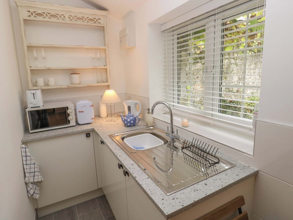Fridge, electric kettle, toaster, cookware/dishes/utensils