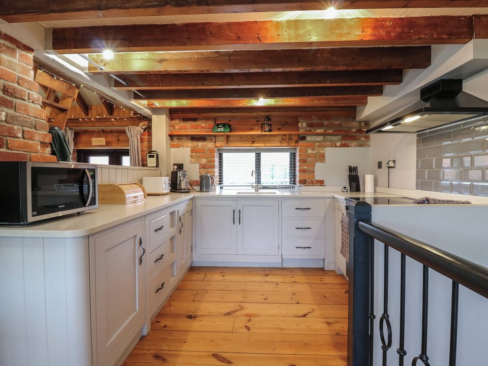 Fridge, dishwasher, electric kettle, cookware/dishes/utensils