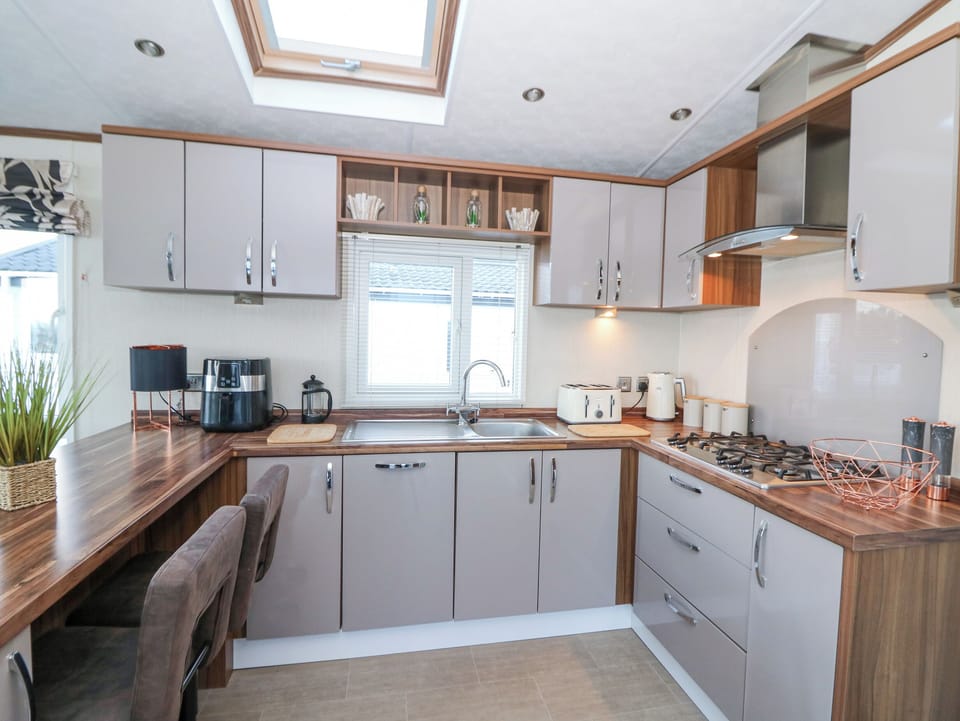 Fridge, electric kettle, toaster, cookware/dishes/utensils
