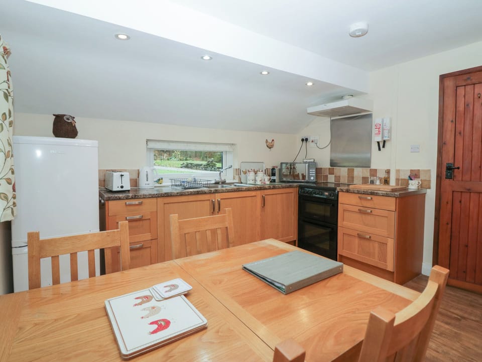 Fridge, electric kettle, toaster, cookware/dishes/utensils