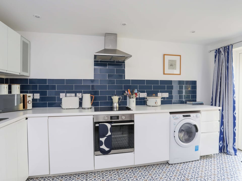 Fridge, electric kettle, toaster, cookware/dishes/utensils