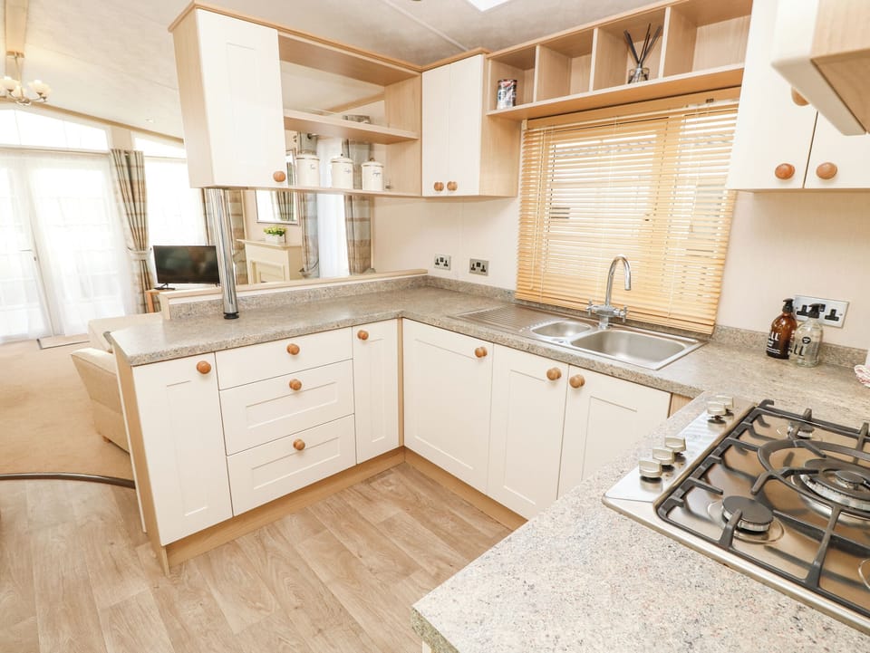 Fridge, electric kettle, toaster, cookware/dishes/utensils