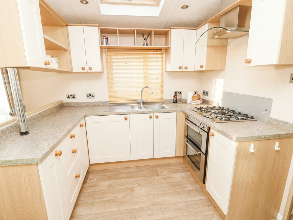 Fridge, electric kettle, toaster, cookware/dishes/utensils