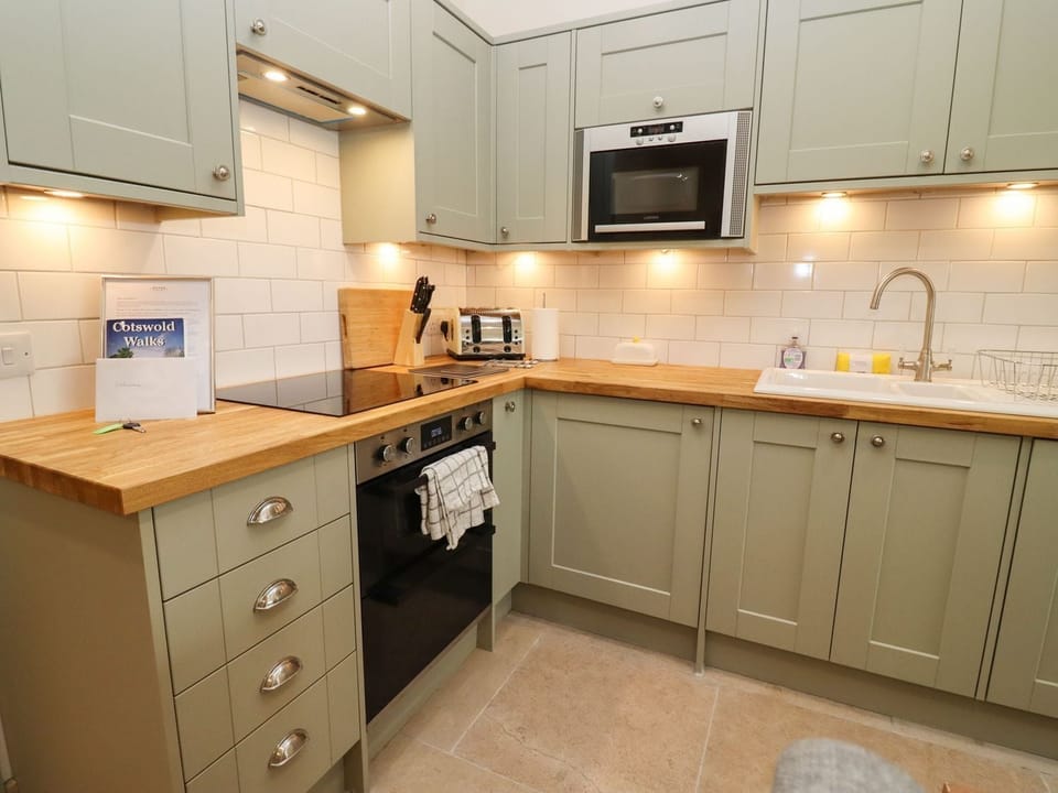Fridge, dishwasher, electric kettle, cookware/dishes/utensils