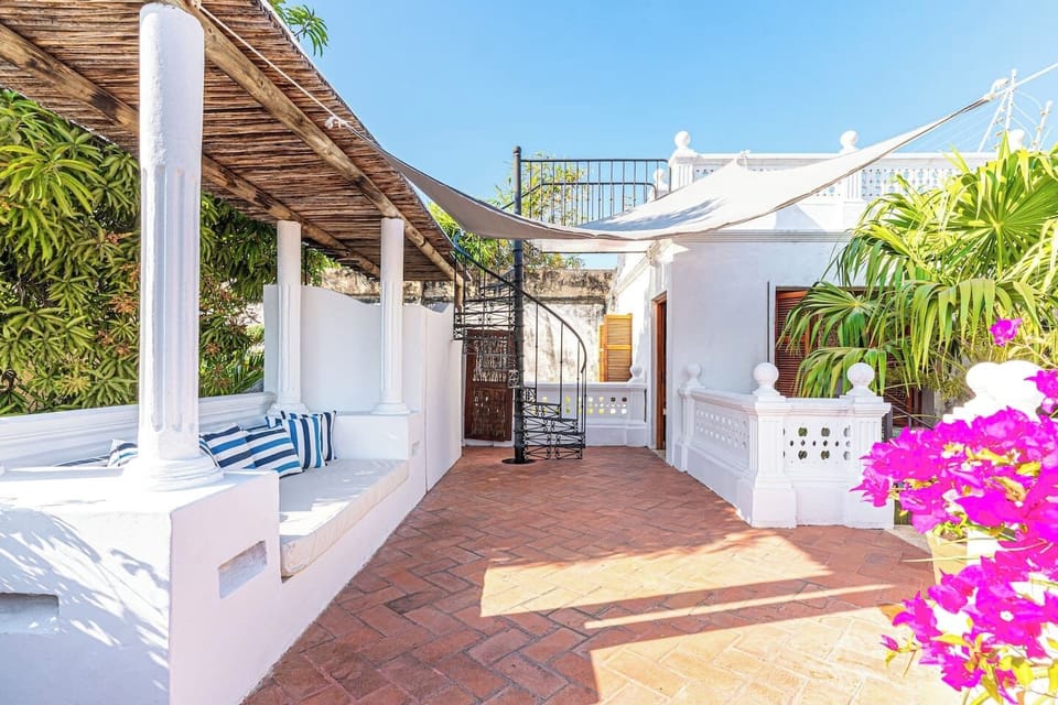Terrace · Sun loungers · Tropical garden · Third floor