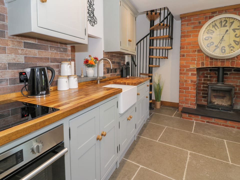Fridge, electric kettle, toaster, cookware/dishes/utensils