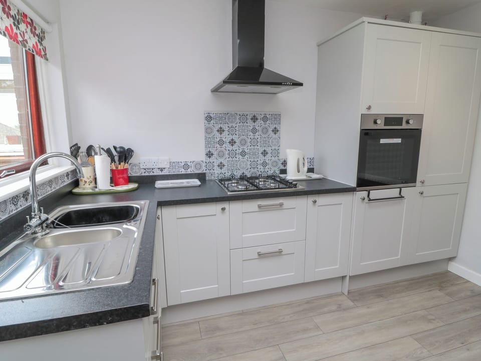 Fridge, electric kettle, toaster, cookware/dishes/utensils