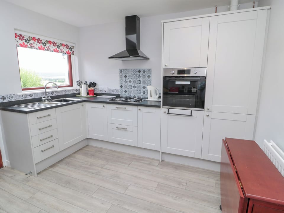 Fridge, electric kettle, toaster, cookware/dishes/utensils