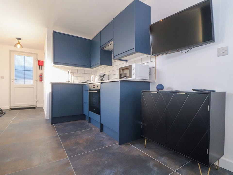 Fridge, electric kettle, toaster, cookware/dishes/utensils