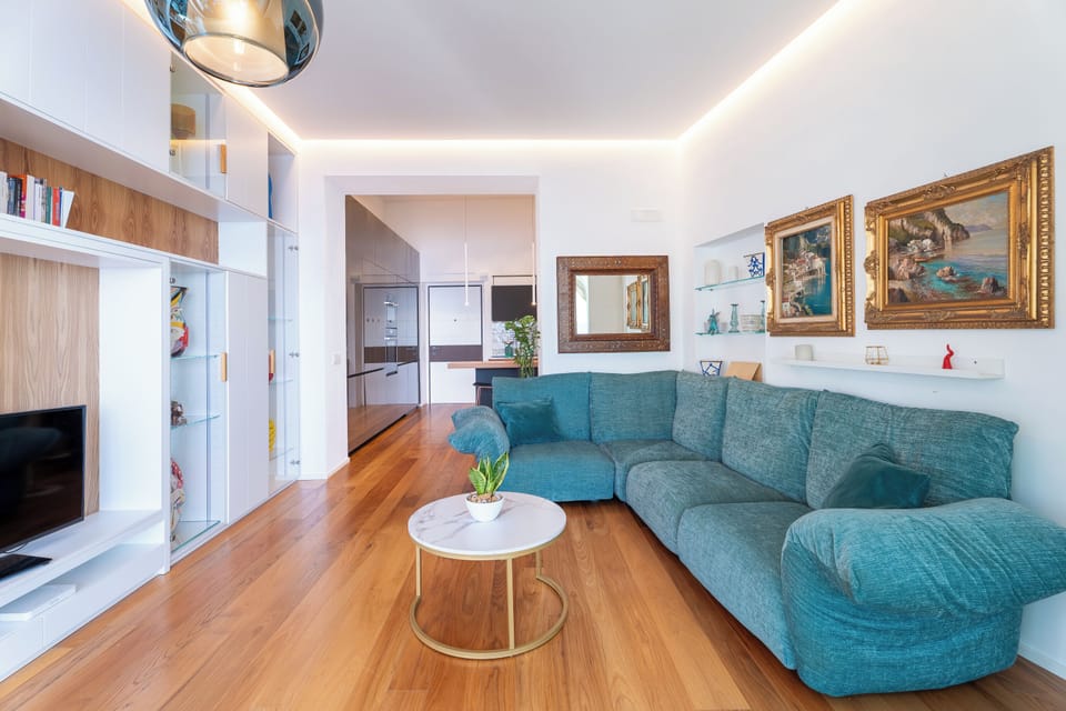 Apartment, 2 Bedrooms, Balcony, Sea View | Living area | 32-inch flat-screen TV with cable channels