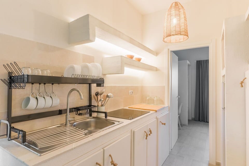 Interior Design, Countertop, Wood, Kitchen, Flooring, Furniture, Cabinetry, Floor, Lighting, Home
