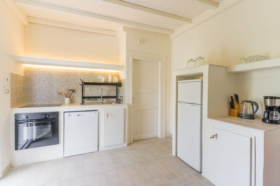 Interior Design, Flooring, Countertop, Kitchen, Floor, Major Appliance, Ceiling, Cabinetry, Kitchen Appliance, Room