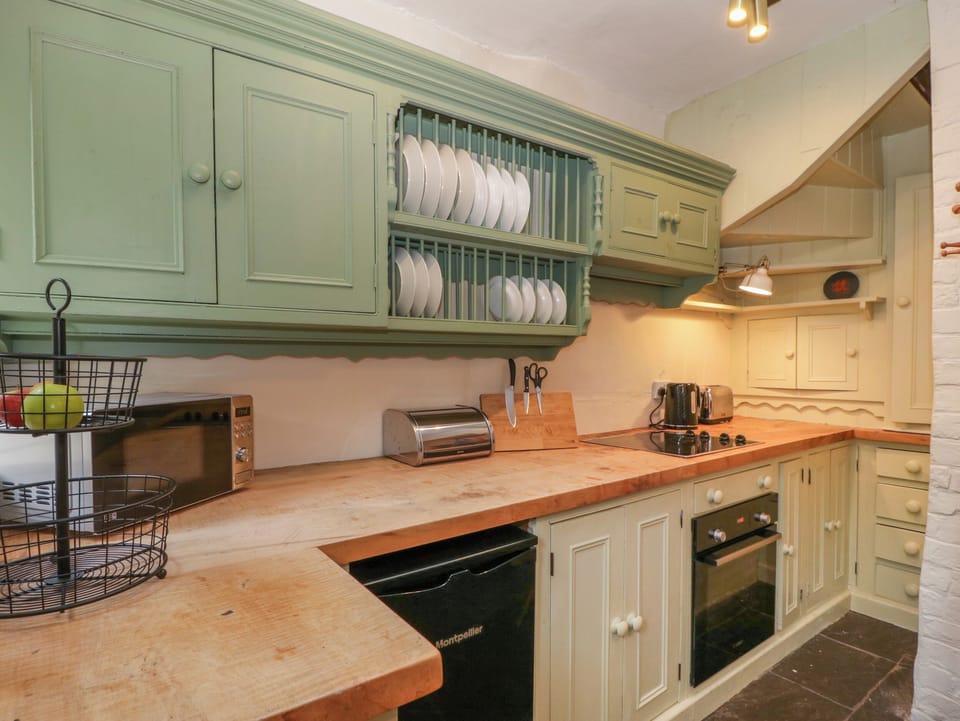 Fridge, electric kettle, toaster, cookware/dishes/utensils
