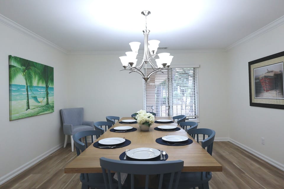 Expansive dining area provides seating for 8