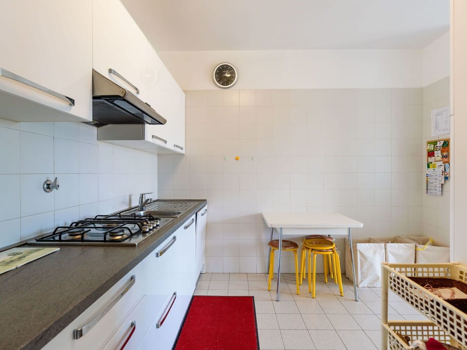 Furniture, Flooring, Home, Floor, Chair, Shade, Apartment, Outdoor Furniture, Houseplant, Kitchen & Dining Room Table