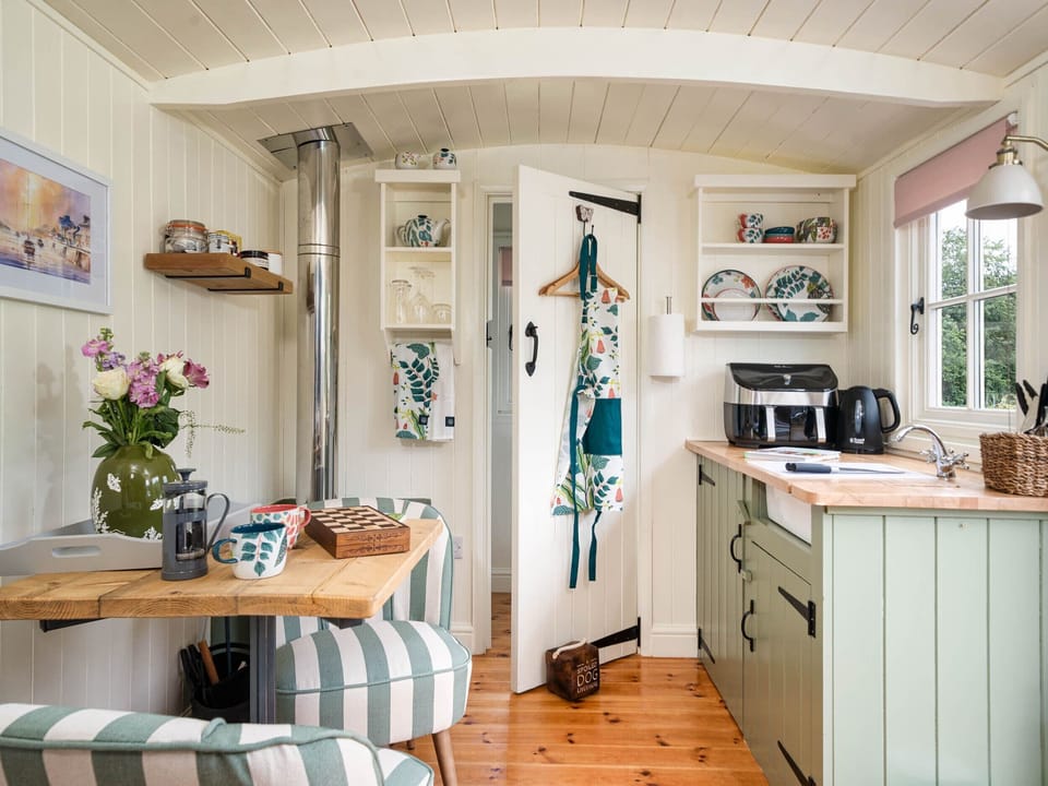 Fridge, electric kettle, toaster, cookware/dishes/utensils