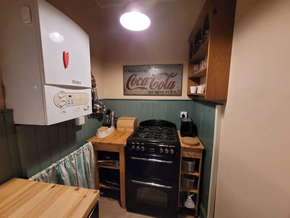 Fridge, electric kettle, toaster, cookware/dishes/utensils