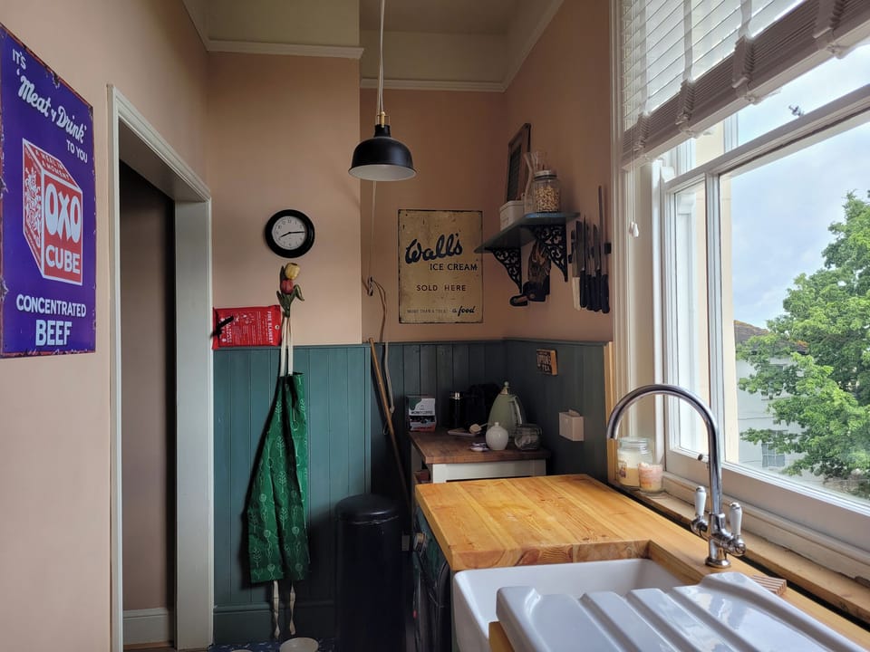 Fridge, electric kettle, toaster, cookware/dishes/utensils