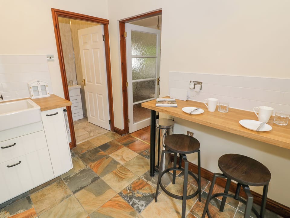 Fridge, electric kettle, toaster, cookware/dishes/utensils