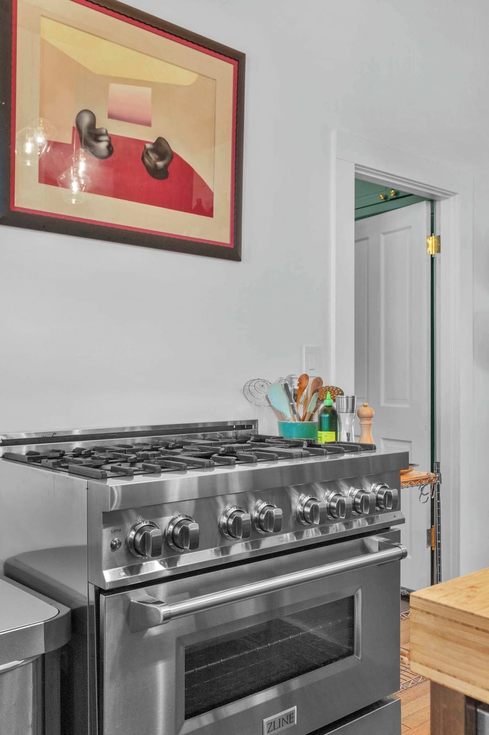 Cook like a pro on the premium gas range. With modern appliances and plenty of room to move, this kitchen is as functional as it is charming.
