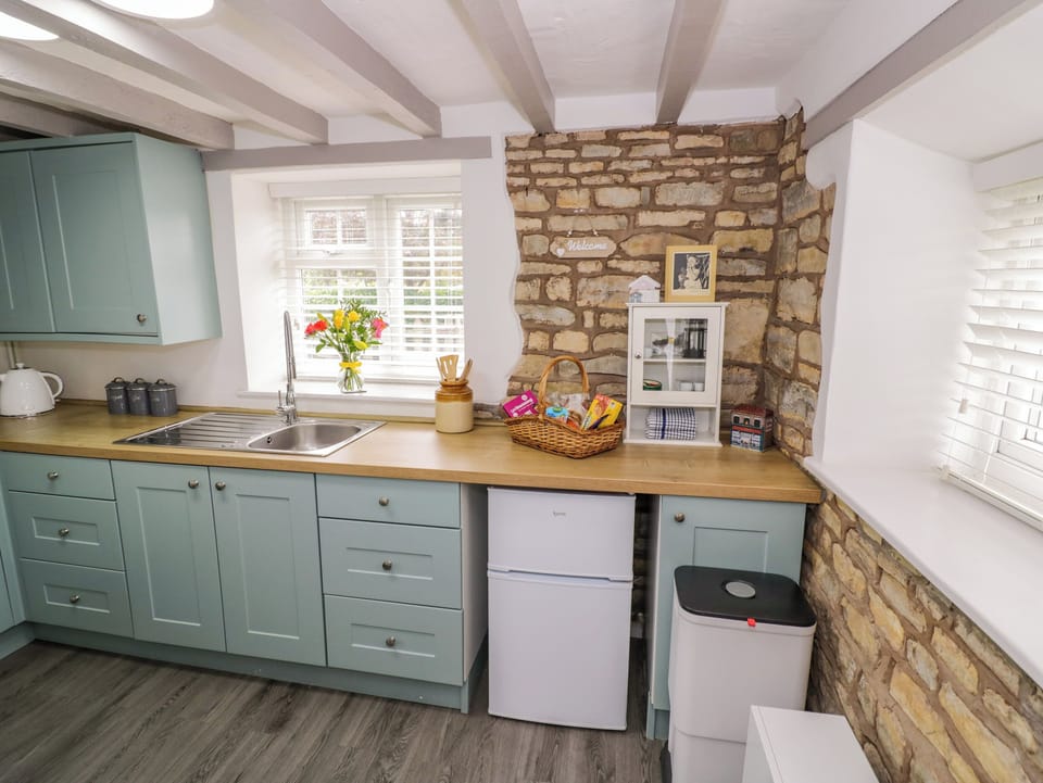 Fridge, electric kettle, toaster, cookware/dishes/utensils