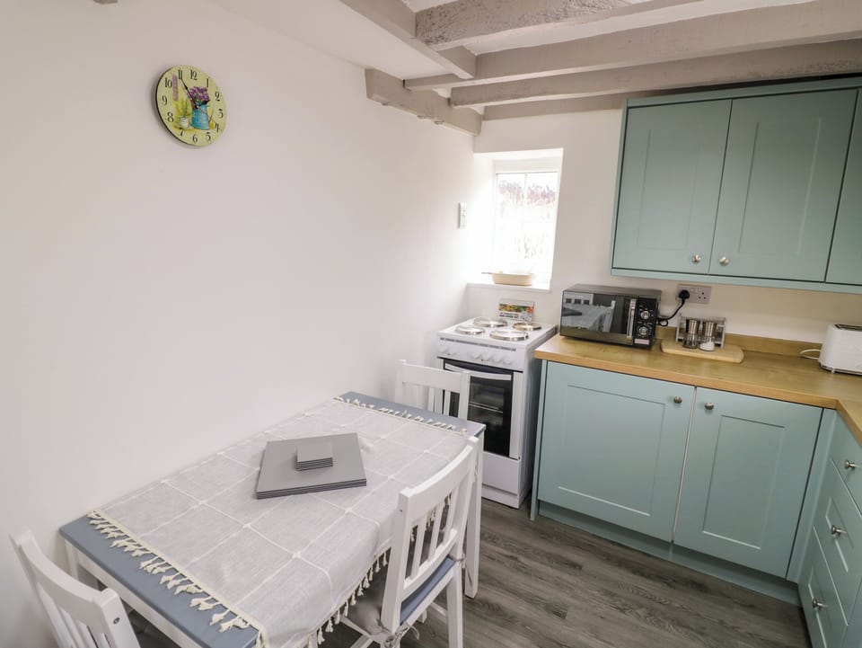 Fridge, electric kettle, toaster, cookware/dishes/utensils