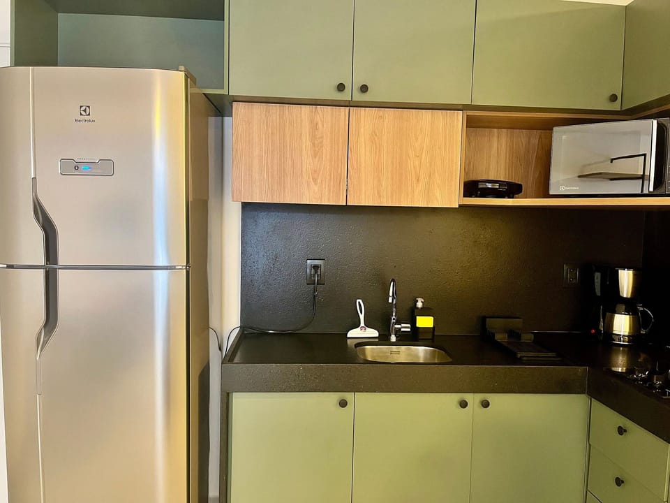 Apartment | Private kitchen | Fridge, microwave, stovetop, cookware/dishes/utensils