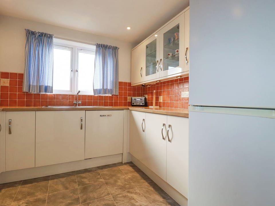 Fridge, dishwasher, electric kettle, toaster
