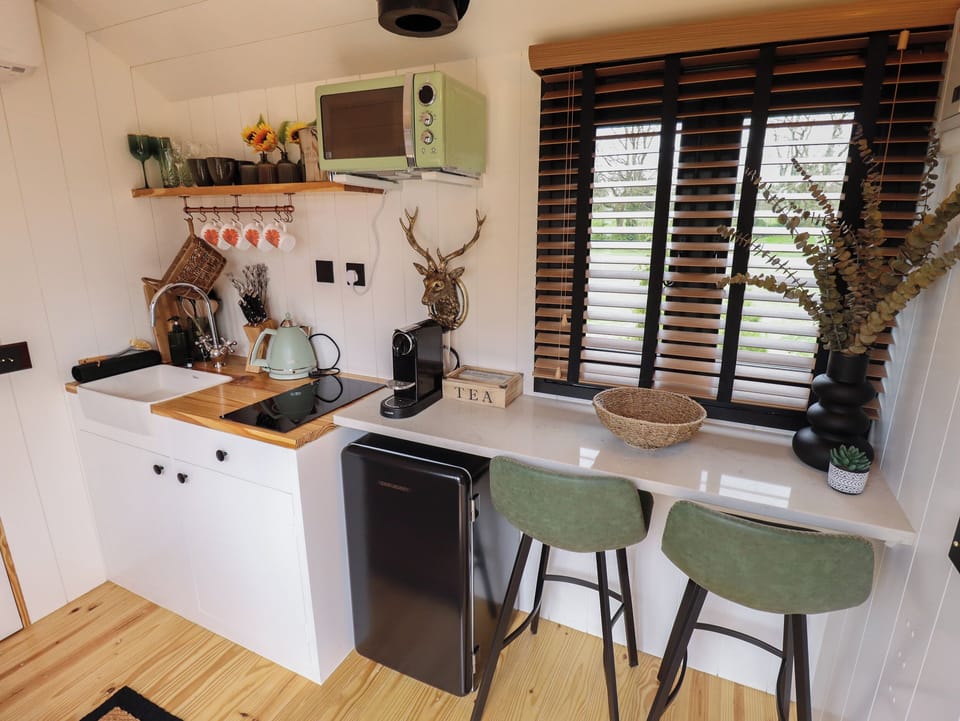 Fridge, electric kettle, toaster, cookware/dishes/utensils