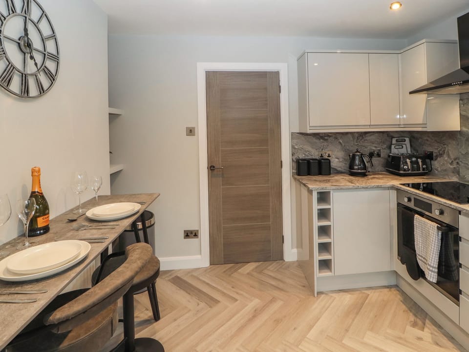 Fridge, electric kettle, toaster, cookware/dishes/utensils