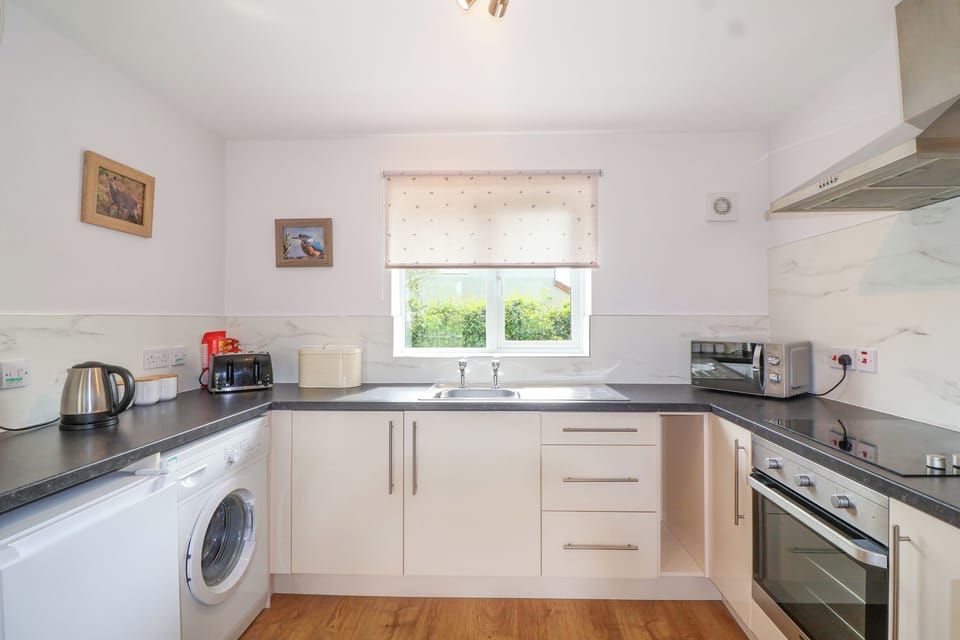 Fridge, electric kettle, toaster, cookware/dishes/utensils