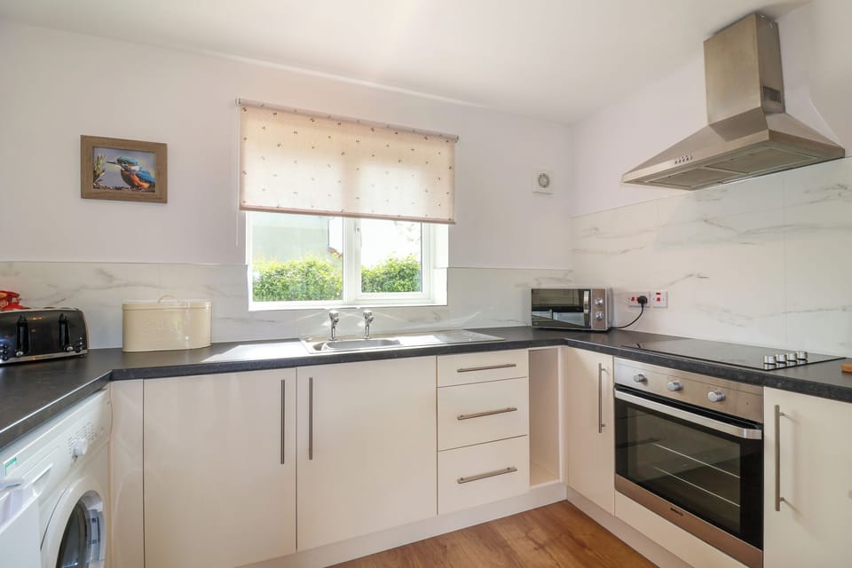 Fridge, electric kettle, toaster, cookware/dishes/utensils